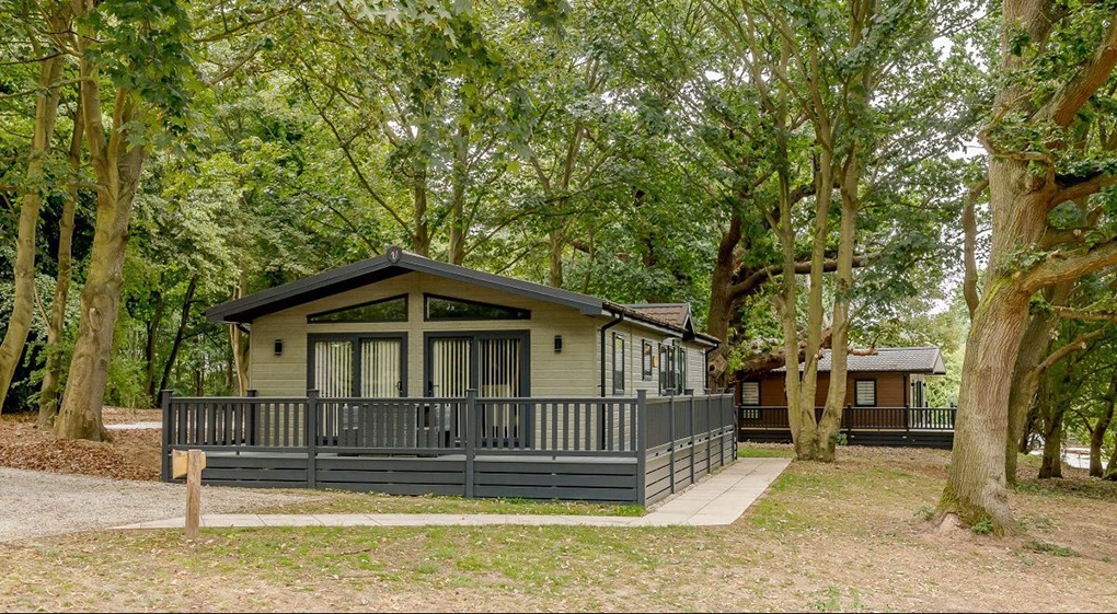 Two of the luxurious lodges at Woolverstone Marina and Lodge Park in Suffolk.